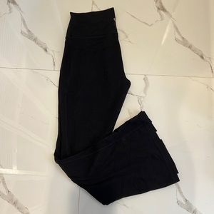 Aritzia TNA flared yoga pants front split